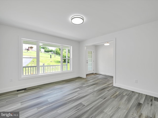 1026 Indian Dr, Auburn, PA 17922 - unfurnished room with baseboards and wood finished floors