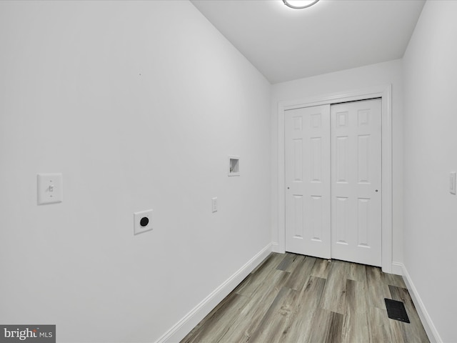 1026 Indian Dr, Auburn, PA 17922 - laundry area with hookup for an electric dryer, baseboards, wood finished floors, and washer hookup