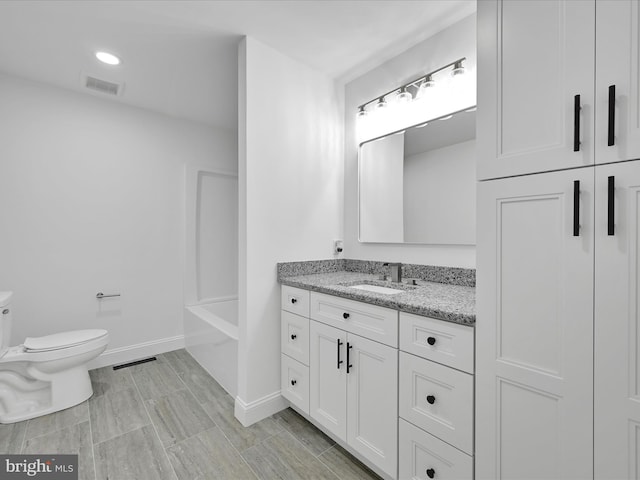 1026 Indian Dr, Auburn, PA 17922 - full bath featuring vanity, toilet, and baseboards