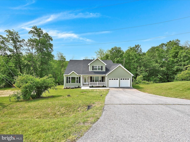 1026 Indian Dr, Auburn, PA 17922 - view of front facade featuring a porch, driveway, a garage, and a front yard