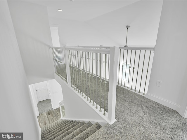 1026 Indian Dr, Auburn, PA 17922 - stairs with carpet, lofted ceiling, baseboards, and a ceiling fan