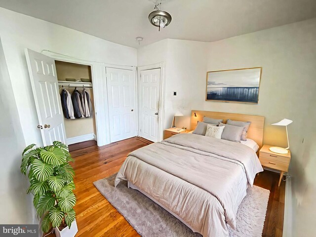 6065 Chester Ave, Philadelphia, PA 19142 - bedroom featuring wood finished floors