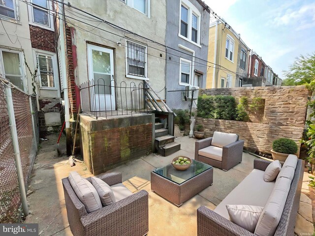 6065 Chester Ave, Philadelphia, PA 19142 - view of patio / terrace featuring an outdoor hangout area and a residential view