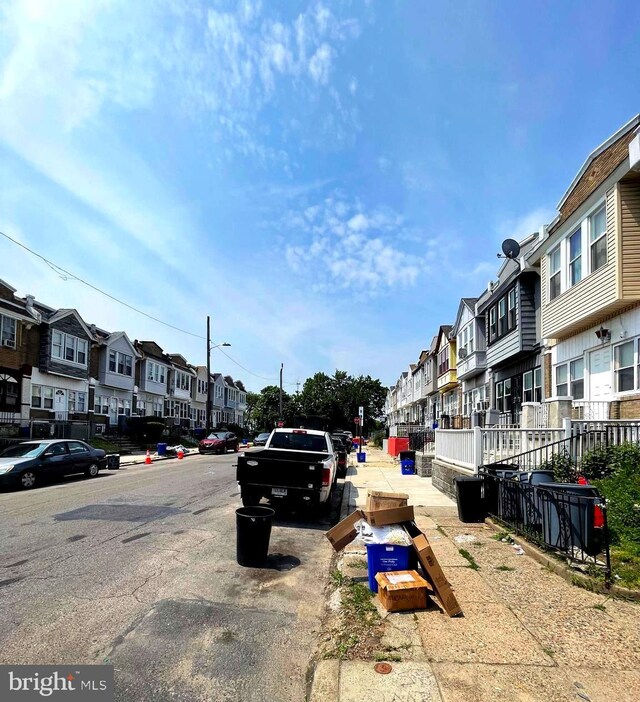 6065 Chester Ave, Philadelphia, PA 19142 - view of asphalt road with a residential view, street lighting, and sidewalks