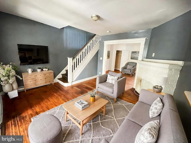 6065 Chester Ave, Philadelphia, PA 19142 - living area featuring stairway and wood finished floors