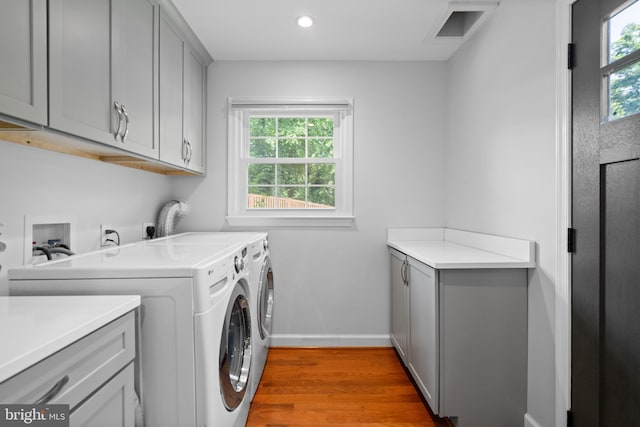 8017 Lake Pleasant Dr, Springfield, VA 22153 - laundry room with cabinet space, light wood-type flooring, plenty of natural light, baseboards, and recessed lighting