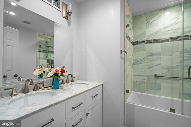 8017 Lake Pleasant Dr, Springfield, VA 22153 - full bathroom with double vanity, bath / shower combo with glass door, and recessed lighting