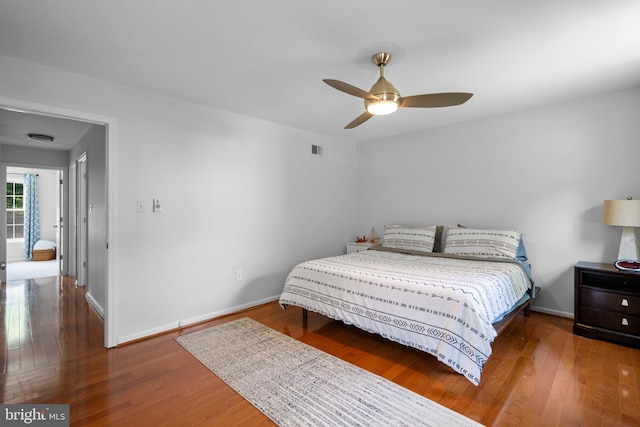 8017 Lake Pleasant Dr, Springfield, VA 22153 - bedroom with wood finished floors, baseboards, and a ceiling fan