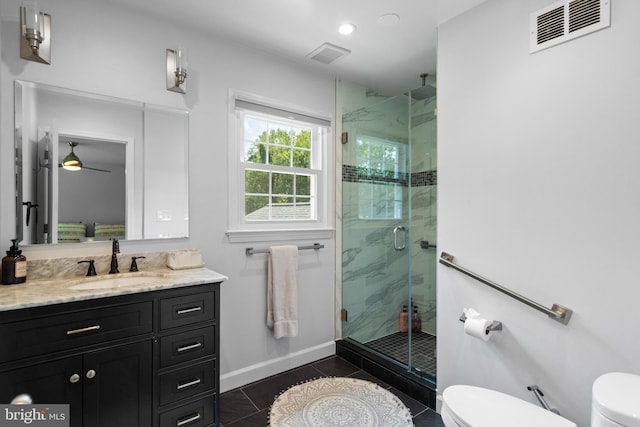 8017 Lake Pleasant Dr, Springfield, VA 22153 - full bath with toilet, a marble finish shower, vanity, and tile patterned floors