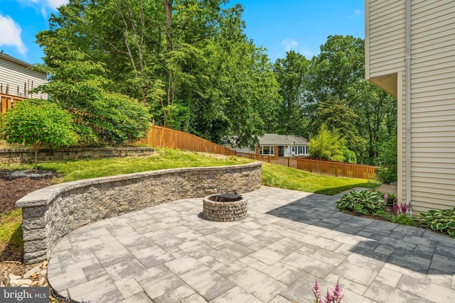 8017 Lake Pleasant Dr, Springfield, VA 22153 - view of patio / terrace with a fire pit