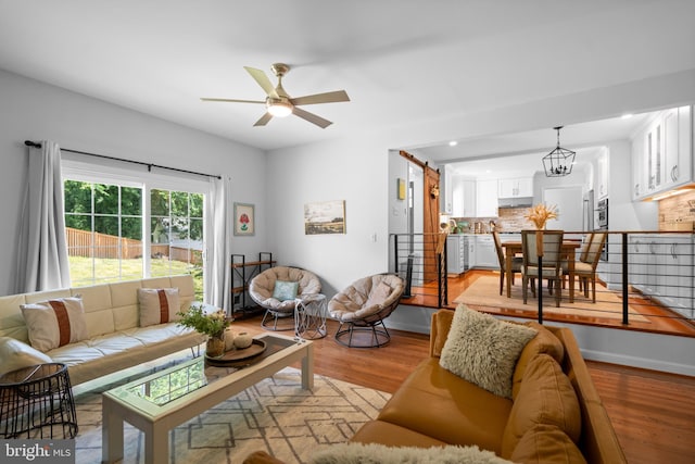 8017 Lake Pleasant Dr, Springfield, VA 22153 - living room with a ceiling fan, light wood-style floors, recessed lighting, and baseboards