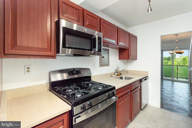 4201 Cathedral Ave NW Unit 910W, Washington, DC 20016 - kitchen with appliances with stainless steel finishes, light countertops, and dark brown cabinets