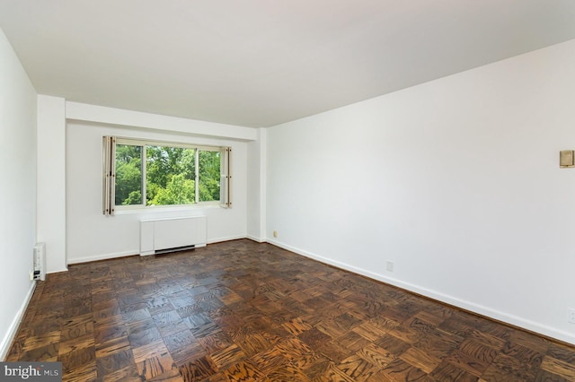 4201 Cathedral Ave NW Unit 910W, Washington, DC 20016 - unfurnished room with radiator heating unit and baseboards