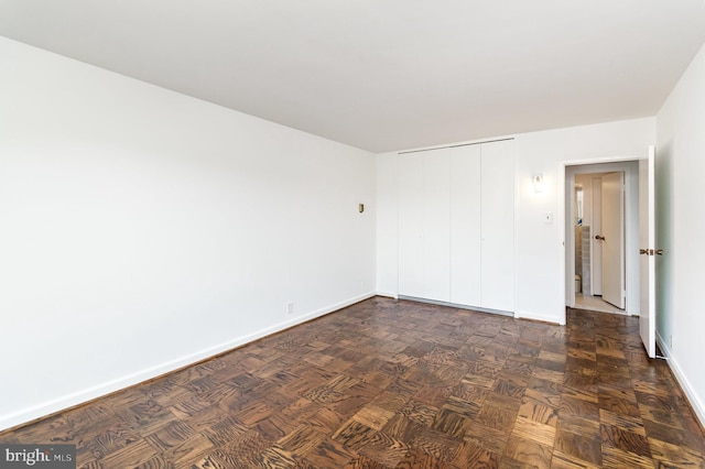 4201 Cathedral Ave NW Unit 910W, Washington, DC 20016 - spare room featuring baseboards