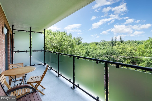 4201 Cathedral Ave NW Unit 910W, Washington, DC 20016 - balcony featuring a view of trees