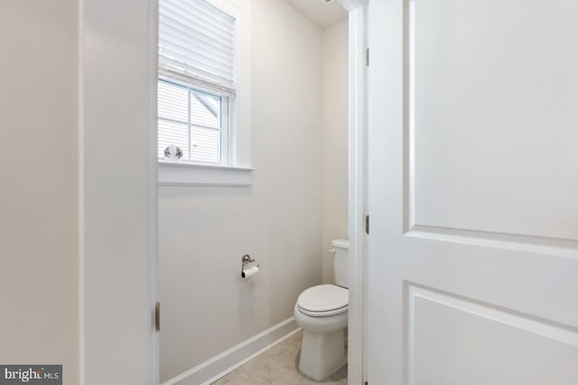 24360 Caldwell Cir, Lewes, DE 19958 - bathroom featuring toilet and baseboards
