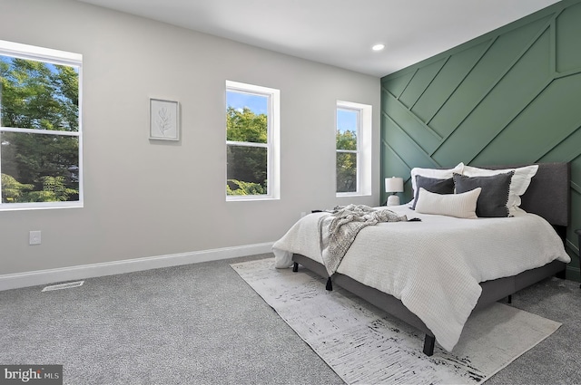 3121 Gwynns Falls Pkwy, Baltimore, MD 21216 - bedroom with multiple windows, baseboards, light colored carpet, and recessed lighting