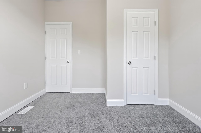 3121 Gwynns Falls Pkwy, Baltimore, MD 21216 - carpeted spare room featuring baseboards