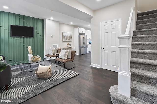 3121 Gwynns Falls Pkwy, Baltimore, MD 21216 - living room featuring dark wood finished floors, stairway, recessed lighting, and baseboards