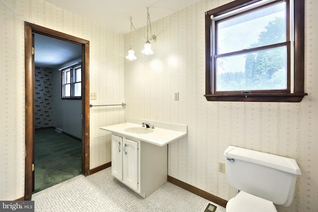 3314 Skyview Dr, Glenville, PA 17329 - bathroom with vanity, toilet, tile patterned floors, wallpapered walls, and baseboards