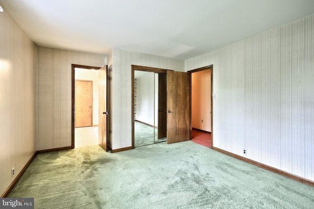 3314 Skyview Dr, Glenville, PA 17329 - unfurnished bedroom featuring carpet, a closet, baseboards, and wallpapered walls