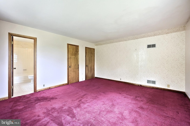 3314 Skyview Dr, Glenville, PA 17329 - unfurnished bedroom featuring carpet, two closets, connected bathroom, and baseboards