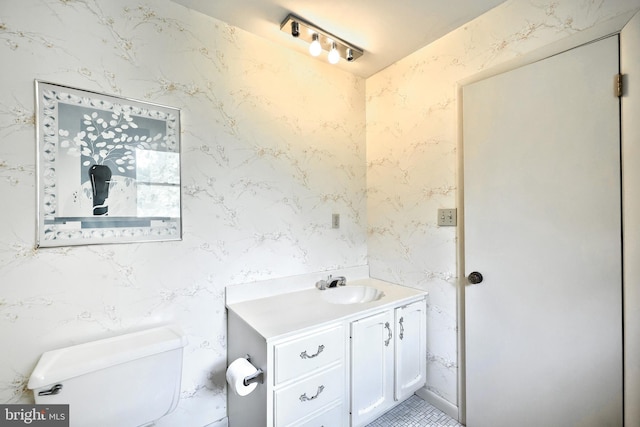3314 Skyview Dr, Glenville, PA 17329 - bathroom featuring vanity, toilet, and wallpapered walls