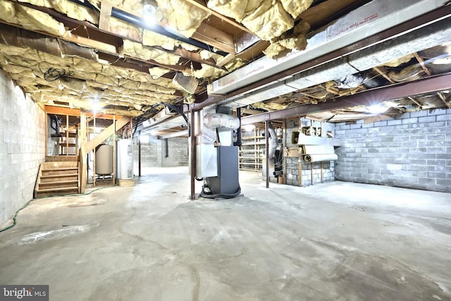 3314 Skyview Dr, Glenville, PA 17329 - unfinished basement featuring stairway, heating unit, and electric water heater