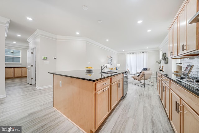 9563 Jefferson St, Manassas, VA 20110 - kitchen with a sink, ornamental molding, light wood-style flooring, a center island with sink, and tasteful backsplash