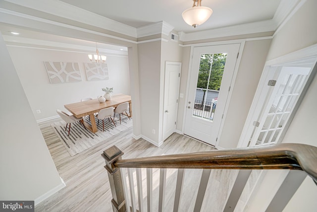 9563 Jefferson St, Manassas, VA 20110 - entrance foyer with a chandelier, baseboards, wood finished floors, and crown molding