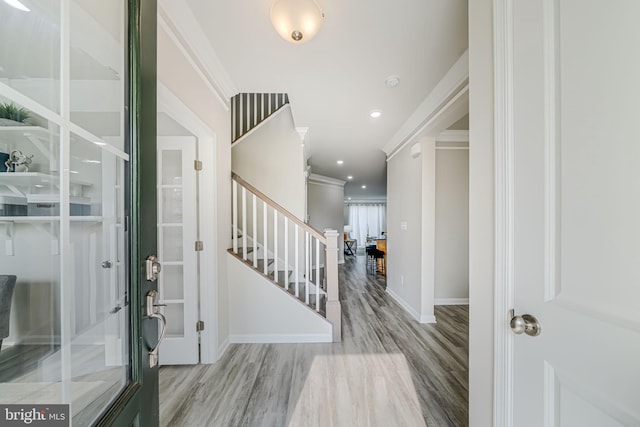 9563 Jefferson St, Manassas, VA 20110 - foyer entrance with stairway, baseboards, wood finished floors, crown molding, and recessed lighting
