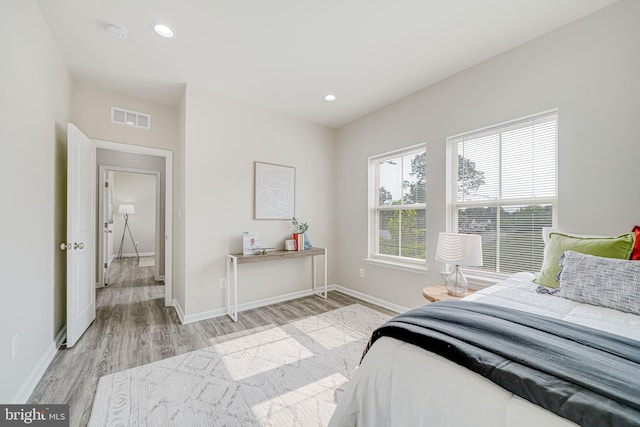 9563 Jefferson St, Manassas, VA 20110 - bedroom featuring baseboards, light wood-style flooring, and recessed lighting