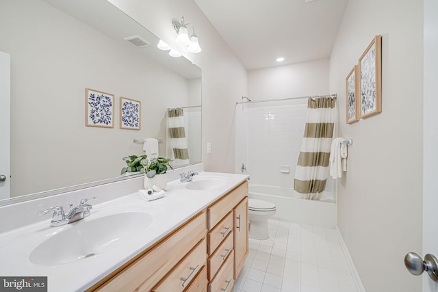 9563 Jefferson St, Manassas, VA 20110 - bathroom featuring tile patterned floors, toilet, double vanity, and shower / tub combo with curtain