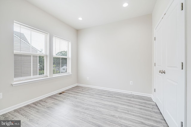 9563 Jefferson St, Manassas, VA 20110 - unfurnished room with light wood-style flooring, baseboards, and recessed lighting