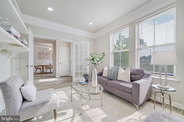 9563 Jefferson St, Manassas, VA 20110 - living area with french doors, baseboards, light wood-type flooring, ornamental molding, and recessed lighting