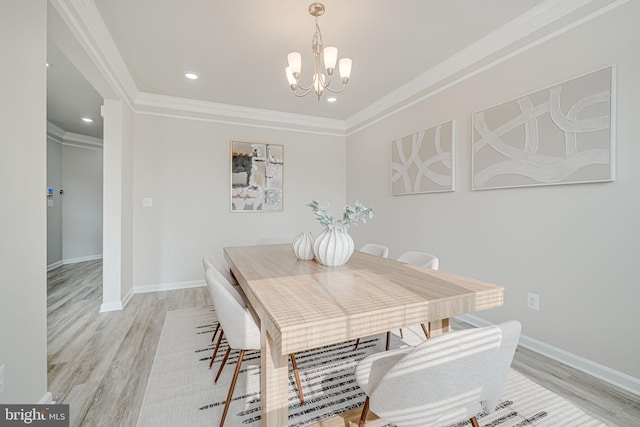 9563 Jefferson St, Manassas, VA 20110 - dining area with a chandelier, light wood finished floors, crown molding, recessed lighting, and baseboards