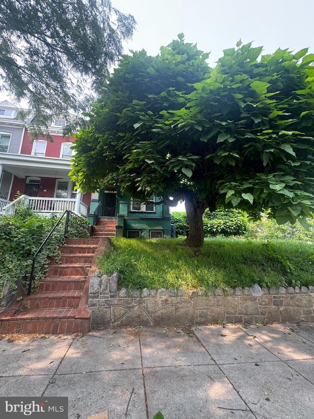 236 Randolph Pl NE, Washington, DC 20002 - obstructed view of property featuring stairway and a porch