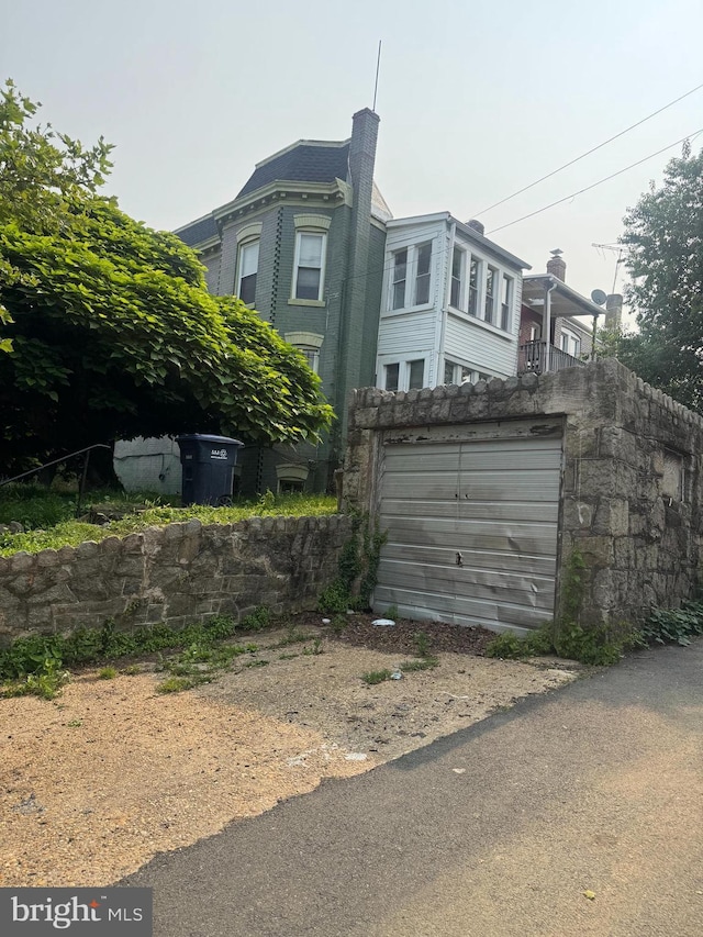 236 Randolph Pl NE, Washington, DC 20002 - rear view of property featuring an attached garage