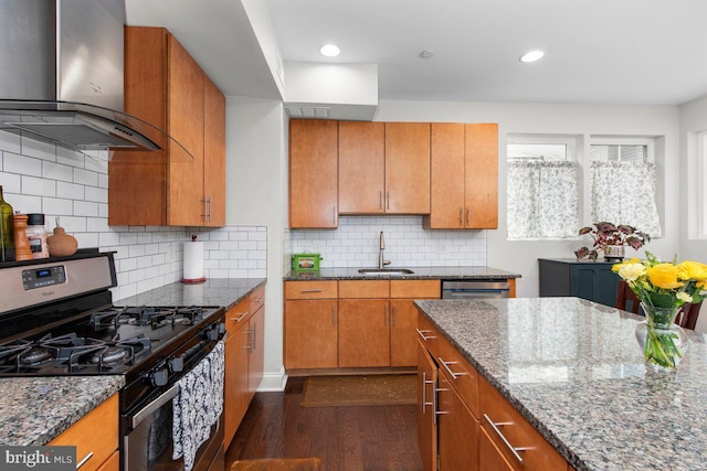1204 S 12th St Unit O, Philadelphia, PA 19147 - kitchen featuring stainless steel appliances, wall chimney range hood, a sink, dark wood-style floors, and brown cabinets