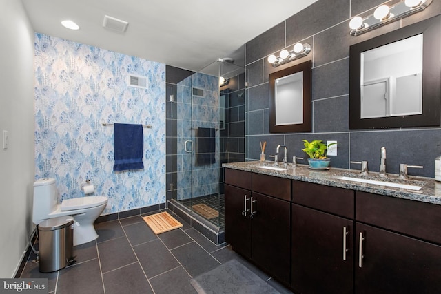 1204 S 12th St Unit O, Philadelphia, PA 19147 - full bath with double vanity, a shower stall, tile patterned floors, toilet, and baseboards