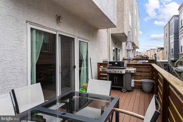 1204 S 12th St Unit O, Philadelphia, PA 19147 - wooden deck featuring a grill and outdoor dining area