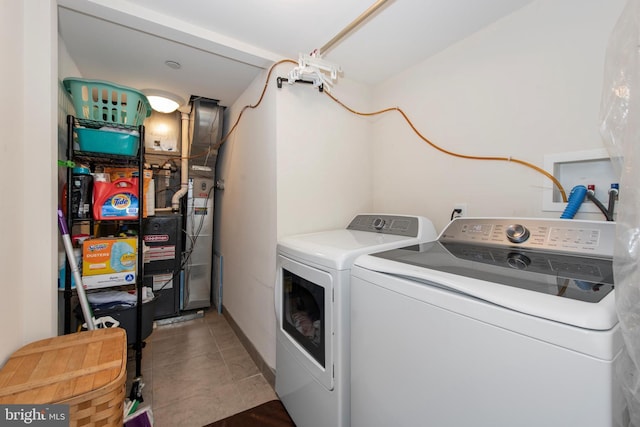 1204 S 12th St Unit O, Philadelphia, PA 19147 - laundry area with separate washer and dryer and tile patterned flooring