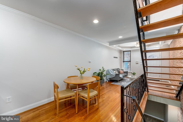 230 N Port St, Baltimore, MD 21224 - dining space featuring light wood-style flooring, ornamental molding, baseboards, and recessed lighting