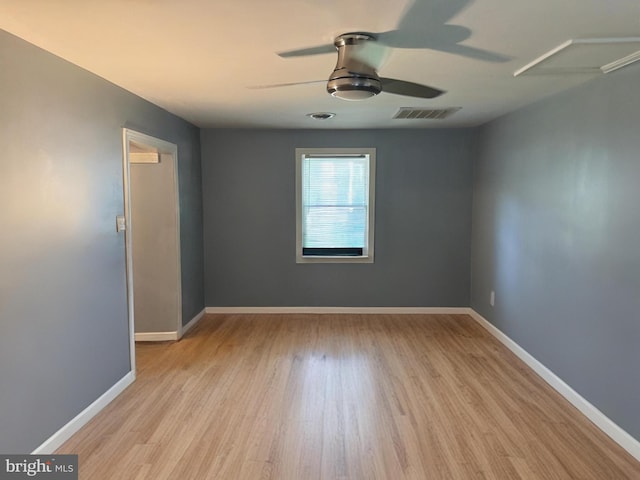 21305 Three Notch Rd, Lexington Park, MD 20653 - spare room featuring ceiling fan, wood finished floors, and baseboards