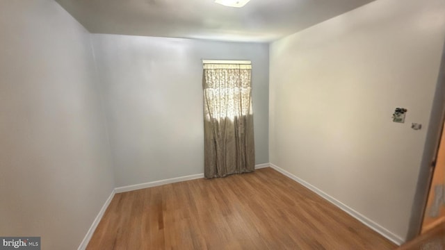 21305 Three Notch Rd, Lexington Park, MD 20653 - unfurnished room featuring wood finished floors and baseboards