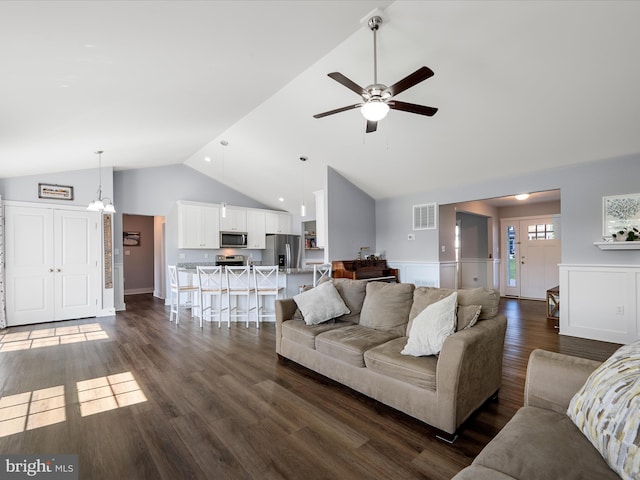 215 Naples Way, Charles Town, WV 25414 - living area with ceiling fan, dark wood-type flooring, a wainscoted wall, and high vaulted ceiling