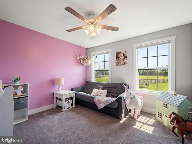 215 Naples Way, Charles Town, WV 25414 - living room featuring a ceiling fan and carpet