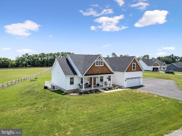 215 Naples Way, Charles Town, WV 25414 - view of front of home featuring covered porch, driveway, and a shingled roof