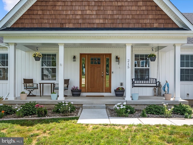 215 Naples Way, Charles Town, WV 25414 - doorway to property featuring a porch and board and batten siding