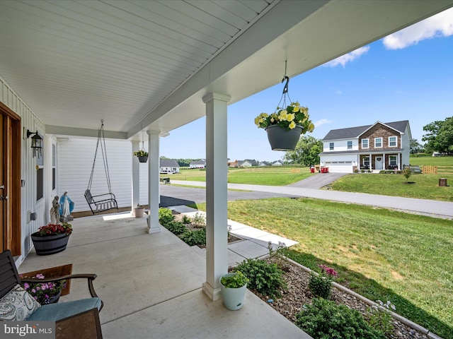 215 Naples Way, Charles Town, WV 25414 - covered porch featuring a yard